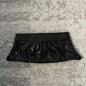 Lauren Merkin classic black snake clutch.